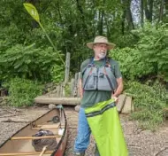  ??  ?? Rick Duncan, site steward of Sycamore Island for the Allegheny Land Trust, stands on the island after pulling his canoe onto the gravel shore.