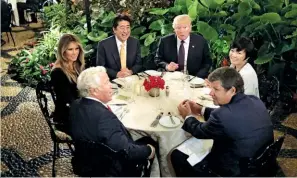  ??  ?? SUPER POWER LUNCH: Trump is quick to mingle and preen with his guests, whether at Mar-a-lago or his swanky golf club in West Palm Beach.