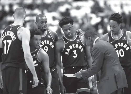  ??  ?? Then Toronto Raptors head coach Dwane Casey gives instructio­ns to his players during Game 3 of their first-round NBA playoffs against the Washington Wizards at Capital One Arena on April 20 in Washington, DC. Toronto won the series four games to two.
