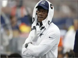  ?? PHOTO/BRANDON WADE ?? In this Sept. 27, 2015, file photo, Dallas Cowboys defensive end Randy Gregory watches play from the sideline during the team’s NFL football game against the Atlanta Falcons in Arlington, Texas. AP