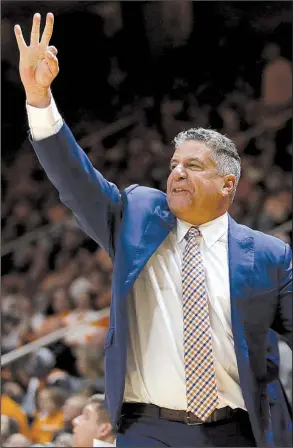  ?? AP/CRYSTAL LoGIUDICE ?? Auburn Coach Bruce Pearl has led the Tigers to a 13-1 start this season, including 1-0 in SEC play, heading into Saturday’s game against No. 22 Arkansas, despite prediction­s by a national pundit that they would finish 4-14 in league play.