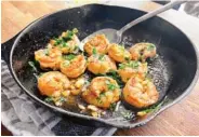  ?? ?? Smoky shrimp scampi is pan-fried shrimp with smoked paprika and lots of chopped garlic.