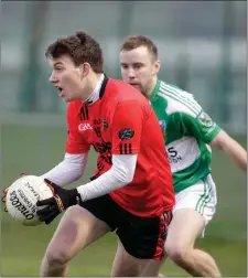  ??  ?? Glenbeigh-Glencar’s Kieran Courtney gets out in front to win possession during last Sunday’s clash with Gabriel Rangers