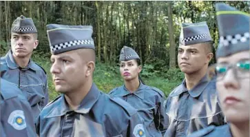  ?? Victor Moriyama For The Times ?? RECRUITS at Sao Paulo’s Superior School for Soldiers must complete 1,983 hours of training over a year’s time before being assigned to the streets. A recent poll showed that 62% of citizens fear violence by the force.