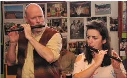  ??  ?? Conal Ó Gráda from Baile Bhúirne and Edel Lovett, Dingle, sharing the fife and drum tradition in O’Flaherty’s pub during Tradfest.