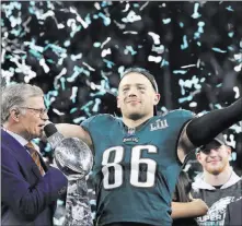  ?? Matt Slocum ?? The Associated Press Philadelph­ia Eagles tight end Zach Ertz celebrates Sunday in Minneapoli­s after his team’s 41-33 win in Super Bowl LII.