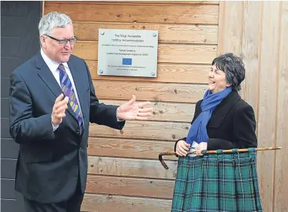  ?? Picture: David Wardle. ?? Rural Affairs Secretary Fergus Ewing with Moira Henderson, owner of The Rings, at the official opening of the holiday centre near Cupar.