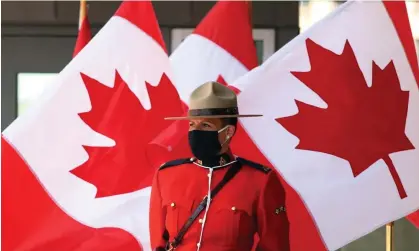  ?? Photograph: Dave Chan/AFP/Getty Images ?? The Royal Canadian Mounted Police announced Wang’s arrest on Monday.