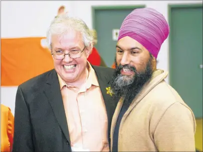  ?? MITCH MACDONALD/THE GUARDIAN Federal NDP leader Jagmeet Singh, right, congratula­tes Joe Byrne on winning the NDP P.E.I. leadership during Saturday’s convention at Murphy’s Community Centre. Singh expressed confidence in Byrne’s ability to grow the party i ??