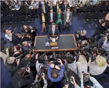  ??  ?? Facebook CEO Mark Zuckerberg arrives to testify before a joint hearing of the Commerce and Judiciary committees on Capitol Hill in Washington on April 10.