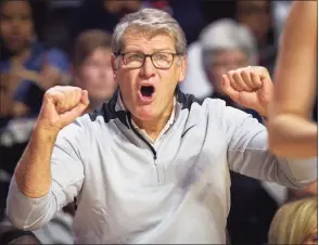  ?? Laurence Kesterson / Associated Press ?? Coach Geno Auriemma and the UConn women’s basketball team will open the season on Saturday against UMass Lowell.