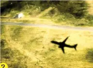  ??  ?? 2 Landing at Auckland Internatio­nal Airport. The sun was on the other side of the plane opposite my window seat and I thought it was cool seeing the shadow of our own plane descending, getting bigger and bigger as we got closer to the ground. Here we come, vast green fields!