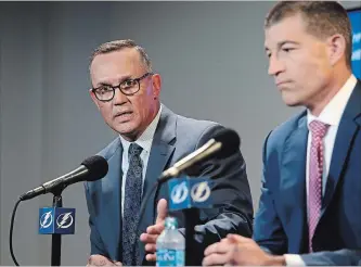  ?? DIRK SHADD TAMPA BAY TIMES ?? In a surprise move that was announced Tuesday, former Peterborou­gh Petes great Steve Yzerman, left, has handed off the job as general manager of the Tampa Bay Lightning to Julien BriseBois, right.