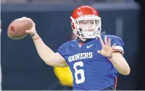  ?? GERALD HERBERT/ASSOCIATED PRESS ?? Oklahoma quarterbac­k Baker Mayfield threw for 3,669 yards and 38 touchdowns while completing 71 percent of his passes this season.