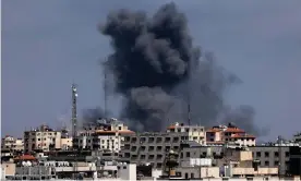  ?? Photograph: Mahmud Hams/AFP/Getty Images ?? Smoke billowing over Gaza City on Wednesday as airstrikes and rocket fire continued.