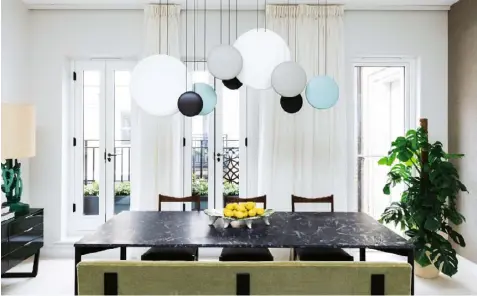  ??  ?? Clockwise from top Statement lighting provides a focal point in the dining room of a town house in St James’s, London; a striking bedroom in a Chelsea apartment; Sophie Ashby, who launched her own practice at 25