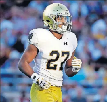  ?? [MICHAEL DWYER/THE ASSOCIATED PRESS] ?? Notre Dame’s Julian Love watches during the second half of a game against Boston College Sept. 16, 2017, in Boston.