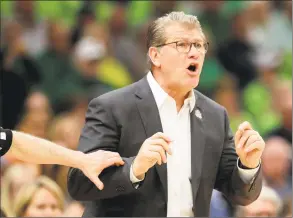  ?? Mike Ehrmann / Getty Images ?? UConn coach Geno Auriemma reacts during the first quarter of Friday’s loss to Notre Dame in Tampa, Fla.