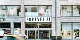  ?? PHOTO:THE NEW YORK TIMES ?? Forever 21 said it would continue to operate its website and hundreds of stores in the United States, Mexico and Latin America