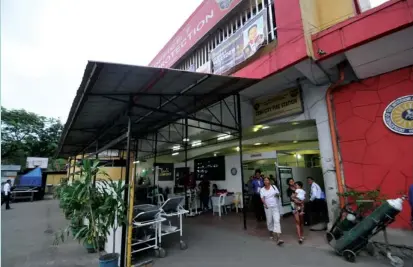  ?? REYNAN VILLENA ?? There is now a temporary Cebu City Medical Center, but the Cebu City government still owes P2.2 million to private hospitals where patients of the old CCMC were taken after the 7.2-magnitude earthquake last year.