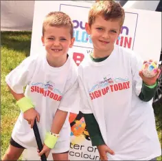  ??  ?? Isaac Hughes and Dylan Copeland supporting the Courtown Colour Run which takes place on July 7 in aid of Gorey Hockey Club.