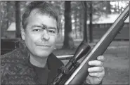  ?? Arkansas Democrat-Gazette/BRYAN HENDRICKS ?? The author traces his muzzleload­er flinch to a range session where the recoil from an inadverten­t double charge caused his scope to gash his forehead.