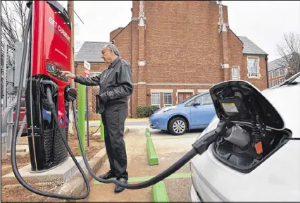  ?? HYOSUB SHIN / HSHIN@AJC.COM ?? Georgia has about 25,000 electric cars on the road, mostly in metro Atlanta and largely funded by what was one of the most generous state tax incentives in the nation — a $5,000 state income tax credit. But state lawmakers, many of them conservati­ves...