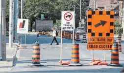  ?? JOHN RENNISON THE HAMILTON SPECTATOR ?? The city has proposed projects that include road resurfacin­g and adding bike lanes to certain streets.