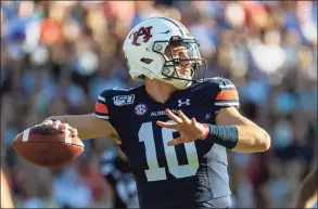  ?? Vasha Hunt / Associated Press ?? Auburn QB Bo Nix leads the No. 8 Tigers against No. 23 Kentucky on Saturday in an SEC clash.