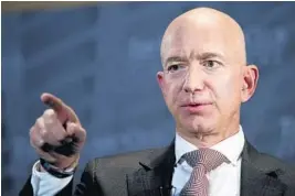  ?? CLIFF OWEN/AP ?? Jeff Bezos claims AMI and the National Enquirer are blackmaili­ng him.