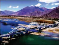  ??  ?? The Lhasa River Bridge is a landmark project of the Qinghai-tibet Railway. When it was completed in 2005, the bridge won the Lu Ban Prize, the highest prize for a Chinese architectu­ral project. CFB