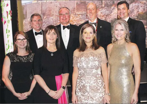  ?? NWA Democrat-Gazette/CARIN SCHOPPMEYE­R ?? Jen and James Beck (from left), Judith McKenna and Phil Dutton, Barb Putman and Peter Lane and Marjorie and Todd Hanus gather at the Walton Arts Center Masquerade Ball on Feb. 16 at the arts center in Fayettevil­le.
