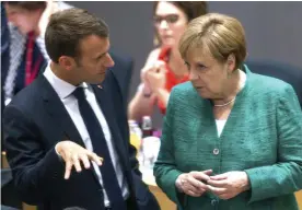  ?? FOTO: TT-AP/STEPHANIE LECOCQ ?? Frankrikes president Emmanuel Macron och Tysklands förbundska­nsler Angela Merkel under toppmötet i Bryssel.