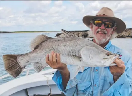  ??  ?? Tony Hare with a nice barra from the Rock