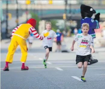  ?? RICHARD LAM ?? The Shaw Mini Sun Run is a great challenge for children and runners of all ages and skill level.