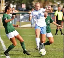  ?? KYLE FRANKO — TRENTONIAN FILE PHOTO ?? Notre Dame’s Morgan Whitlock, center, scored one of the team’s third goals in Thursday’s MCT game against Lawrence.