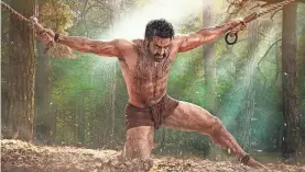  ?? SARIGAMA CINEMAS ?? N.T. Rama Rao Jr. plays a warrior with a mission to return a captured little girl to his tribe in the Indian blockbuste­r action movie “RRR.”