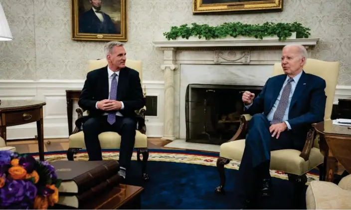 ?? Photograph: Drew Angerer/Getty Images ?? Kevin McCarthy and Joe Biden at the White House on Monday.