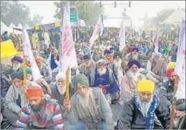  ?? ANI ?? Farmers at a protest against the new farm laws at Singhu Border near Delhi on Sunday.