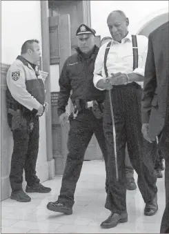  ?? / Mark Makela-Pool Photo via AP ?? Bill Cosby (center right) leaves the courtroom after he was sentenced to three-to 10-years for sexual assault on Sept. 25 in Norristown, Pa.