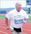  ?? LYNN KUTTER ENTERPRISE-LEADER ?? Roy Rinehart of Lincoln runs the 50-meter race recently during the Senior Games at Harrison High. Senior adults from Farmington, Lincoln and Prairie Grove competed with other seniors in the area.