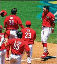  ?? AP/BUTCH DILL ?? Georgia’s Cam Shepherd (right) celebrates with teammates after hitting a game-winning, two-run home run in the ninth inning against Texas A&M at the SEC Tournament on Wednesday. The Bulldogs face Arkansas today.