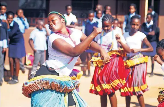  ??  ?? Learners perform Tsonga traditiona­l dance in xibelani skirts at Muswanama Primary School. Photos Lucas Ledwaba Mukurukuru Media