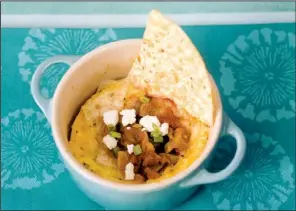  ?? Food Styling/kelly BRANT
Arkansas Democrat-gazette/karen E. SEGRAVE ?? Coffee Cup Chilaquile­s is prepared in the microwave in a coffee cup or ramekin and combines egg, cheese, tortilla chips and salsa.