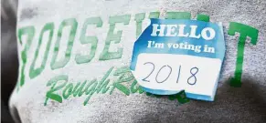  ??  ?? Voting rights: A high school student wearing a sticker saying she is eligible to vote this year as hundreds of youths take part in the National School Walkout to protest gun violence in Seattle, Washington, on March 14. — Reuters