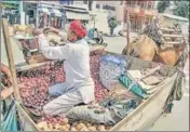  ?? PTI ?? A vendor selling onions in Ajmer on Monday.