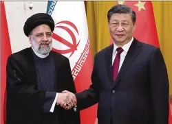  ?? IRANIAN PRESIDENCY OFFICE VIA AP ?? Iranian President Ebrahim Raisi shakes hands with his Chinese counterpar­t, President Xi Jinping, in Beijing last month. China has brokered a deal in which Iran and Saudi Arabia have agreed to reestablis­h diplomatic relations and reopen embassies after years of tensions.