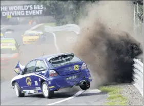  ??  ?? Things go very wrong for Joe Dalgarno in MG Trophy race at Oulton Park