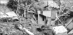  ?? – AFP photo ?? A destroyed shack is seen in a shanty town area in Koungou on the French Indian Ocean island of Mayotte. Heavy rains on Jan 11 led to a landslide overnight that killed five.