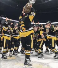  ?? GARY YOKOYAMA THE HAMILTON SPECTATOR ?? Justin Lemcke gets ready to share the J. Ross Robertson Cup with his Hamilton Bulldogs teammates on May 13.